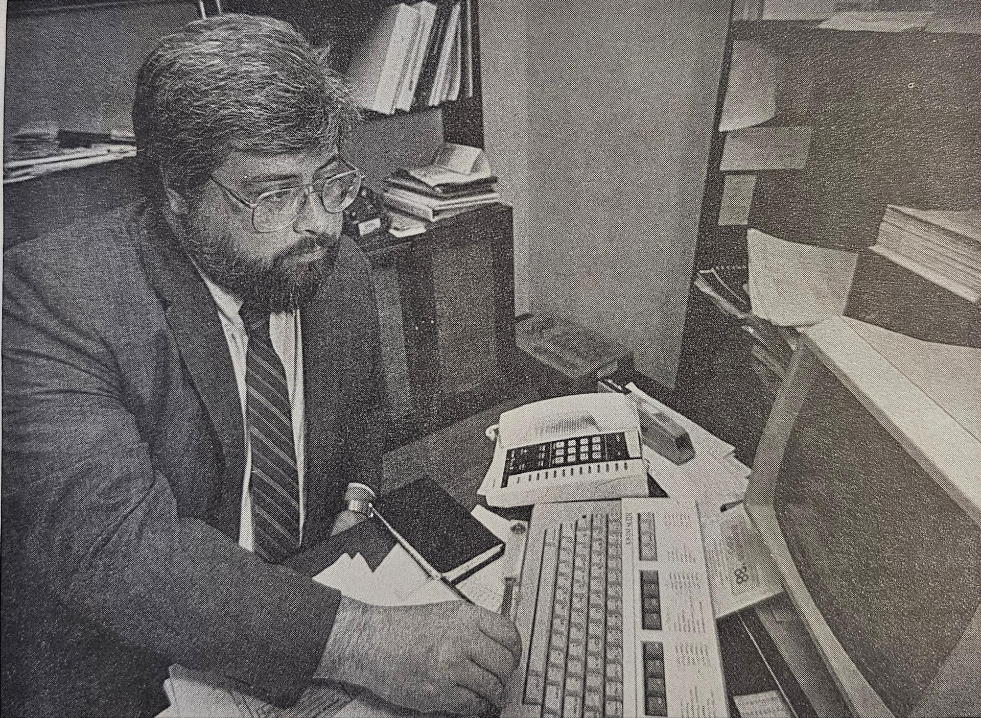 Early career professional working at a desk